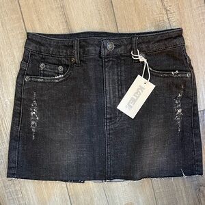 Katie J NYC Distressed Black Denim Skirt